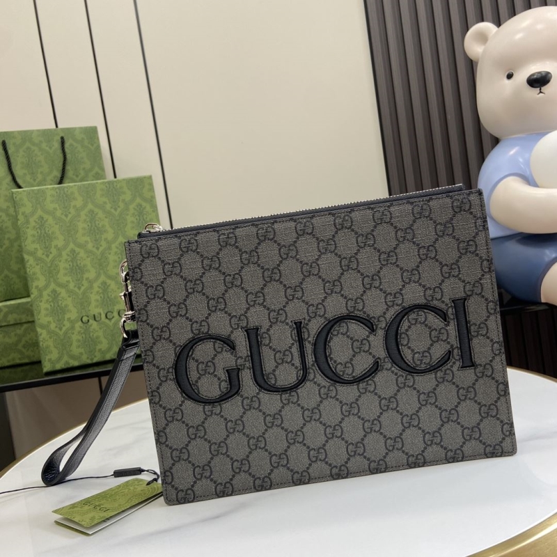 G*u*i clutch bags